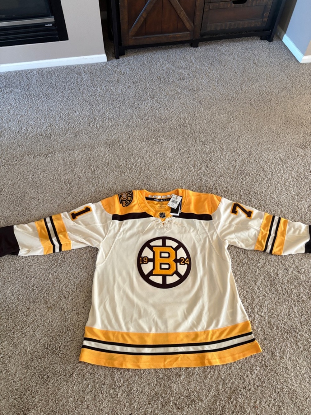 adidas Boston Bruins Cream and Gold Alternate Hockey Jersey.